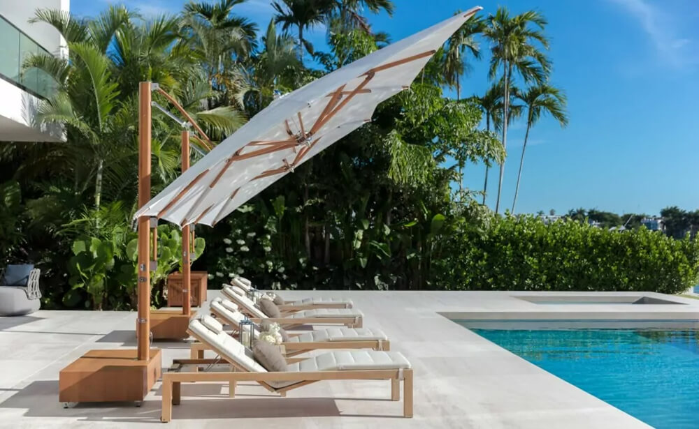 poolside loungers with large sunbrellas